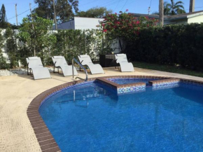 Home with a pool close to beach and FLL airport pool heated October- March